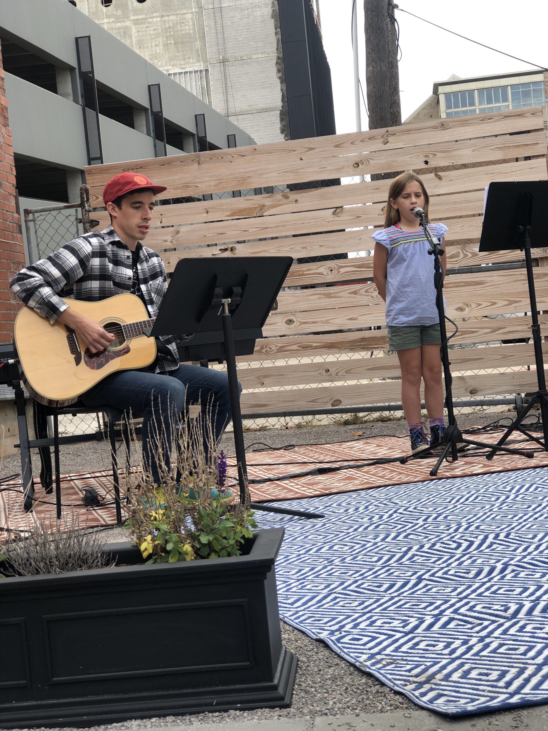 child sining at a coffee shop